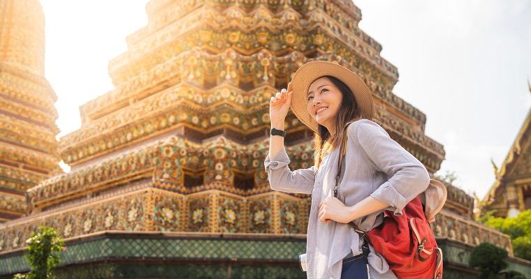 A woman at a temple in Thailand