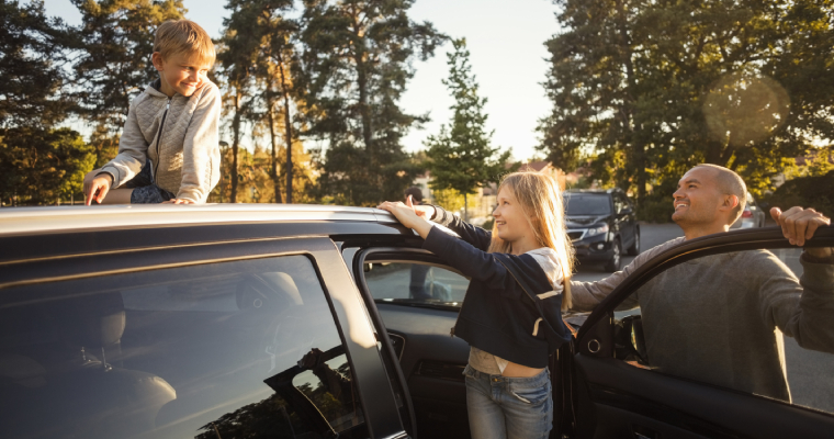 A family getting ready to get into the car