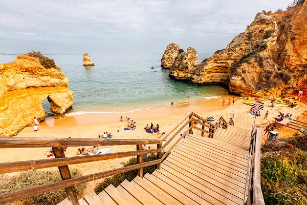 A staircase heading down to a beach in Algarve Portugal