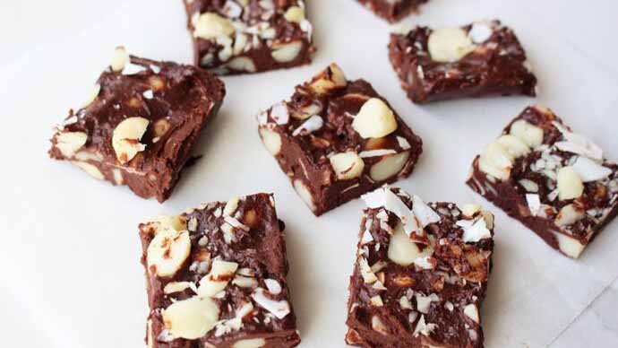 Macadamia brownies on a white plate.