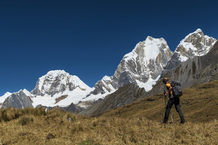 Woman trekking in Peruvian Andes, Cordilllera Huayhuash.