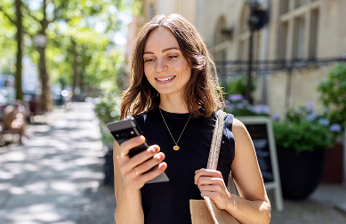 Woman looking at her mobile phone