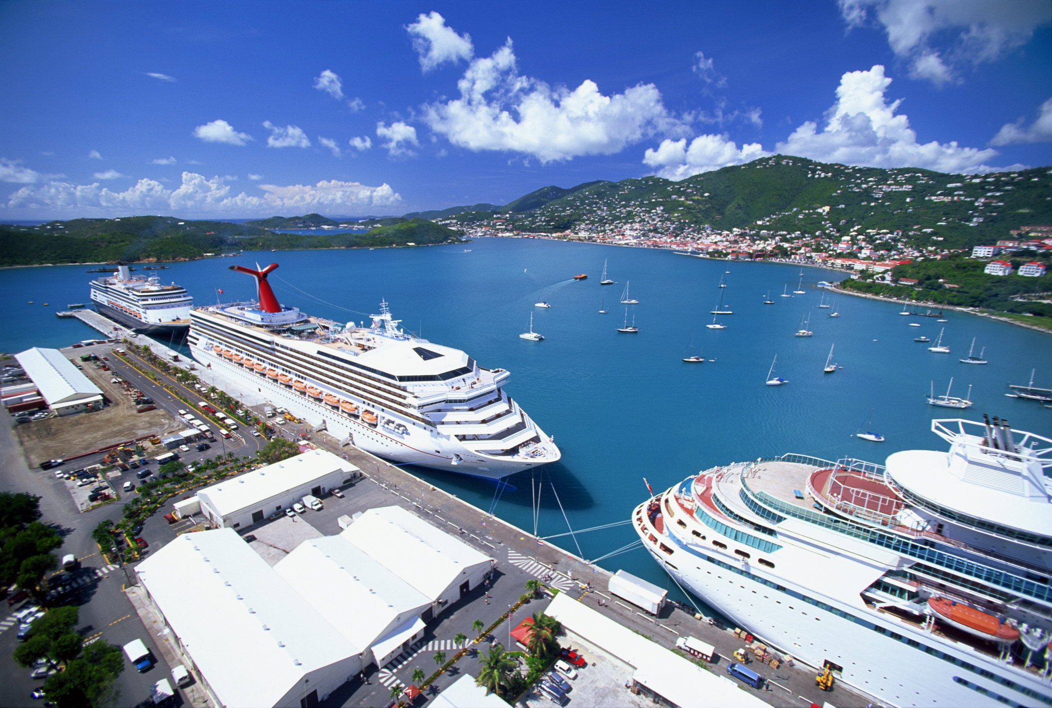 An aerial view of a cruise ship in the Virgin Islands harbour on a sunny day