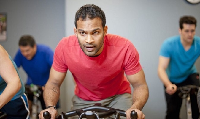 Guy in static bicycle