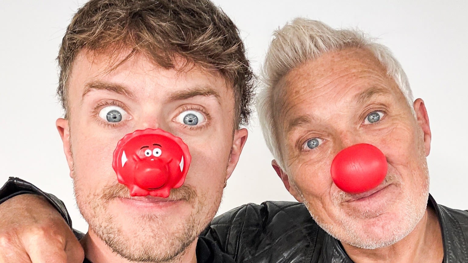 Roman and Martin Kemp wearing red noses