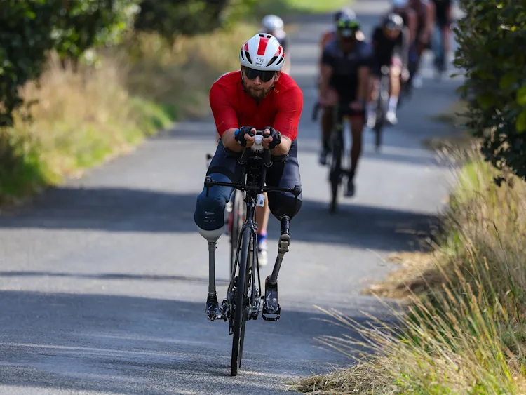 Person cycling on the road