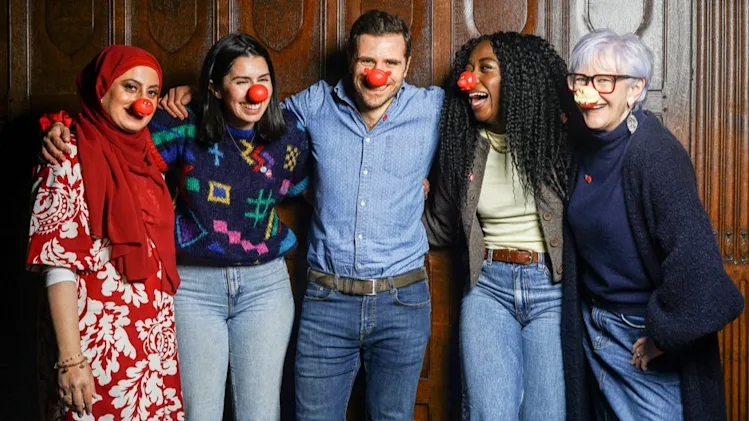 Participants of The Traitors wearing red noses