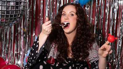 Catherine Bohart eating cake