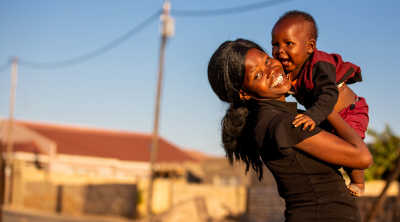 Mother smiling with her child