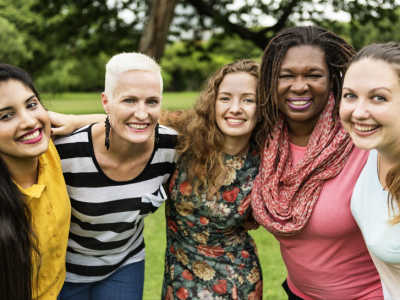 A group with their arms around each other for The Smile Fund