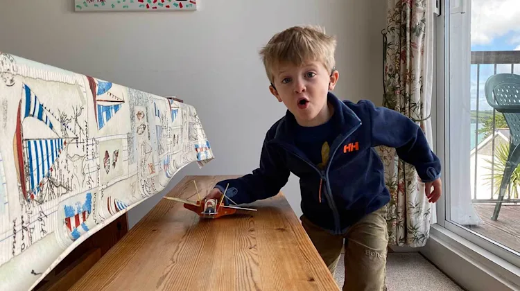 Arlo playing with his toys.