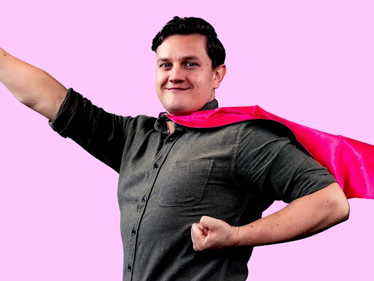 Person doing a superman pose