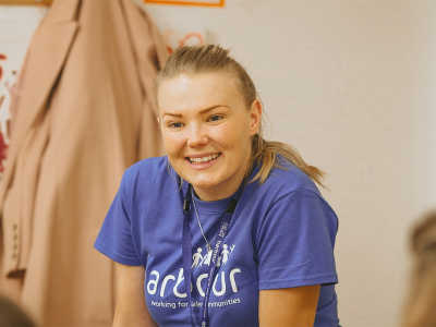 A Harbour staff member smiling