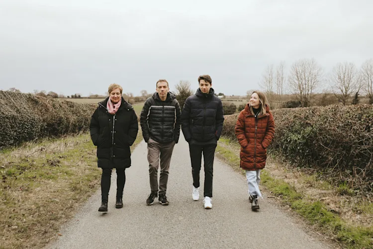 Oliver's family walking up a path