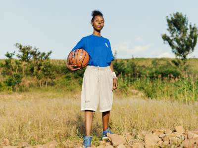 Woman holding a basketball