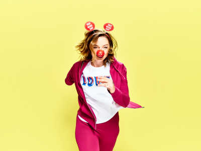 Person running wearing Red Nose Day merchandise