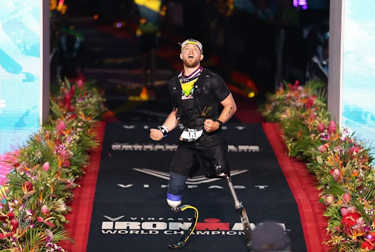 Billy Monger at finish line of IRONMAN World Championships