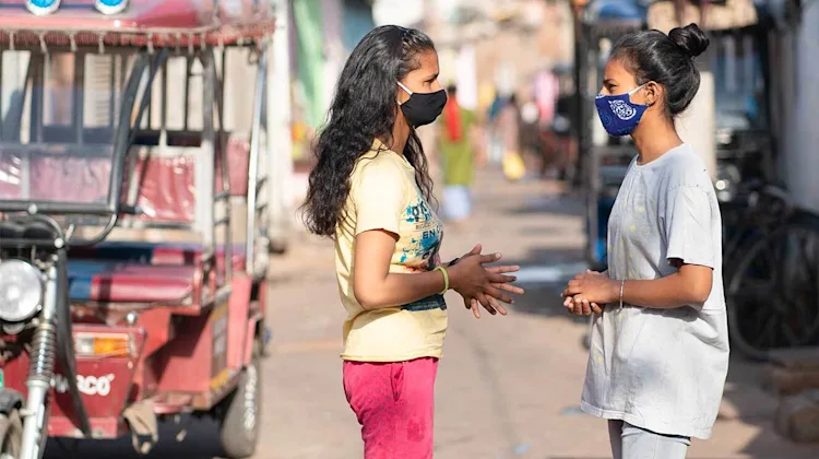 Children talking in their community.