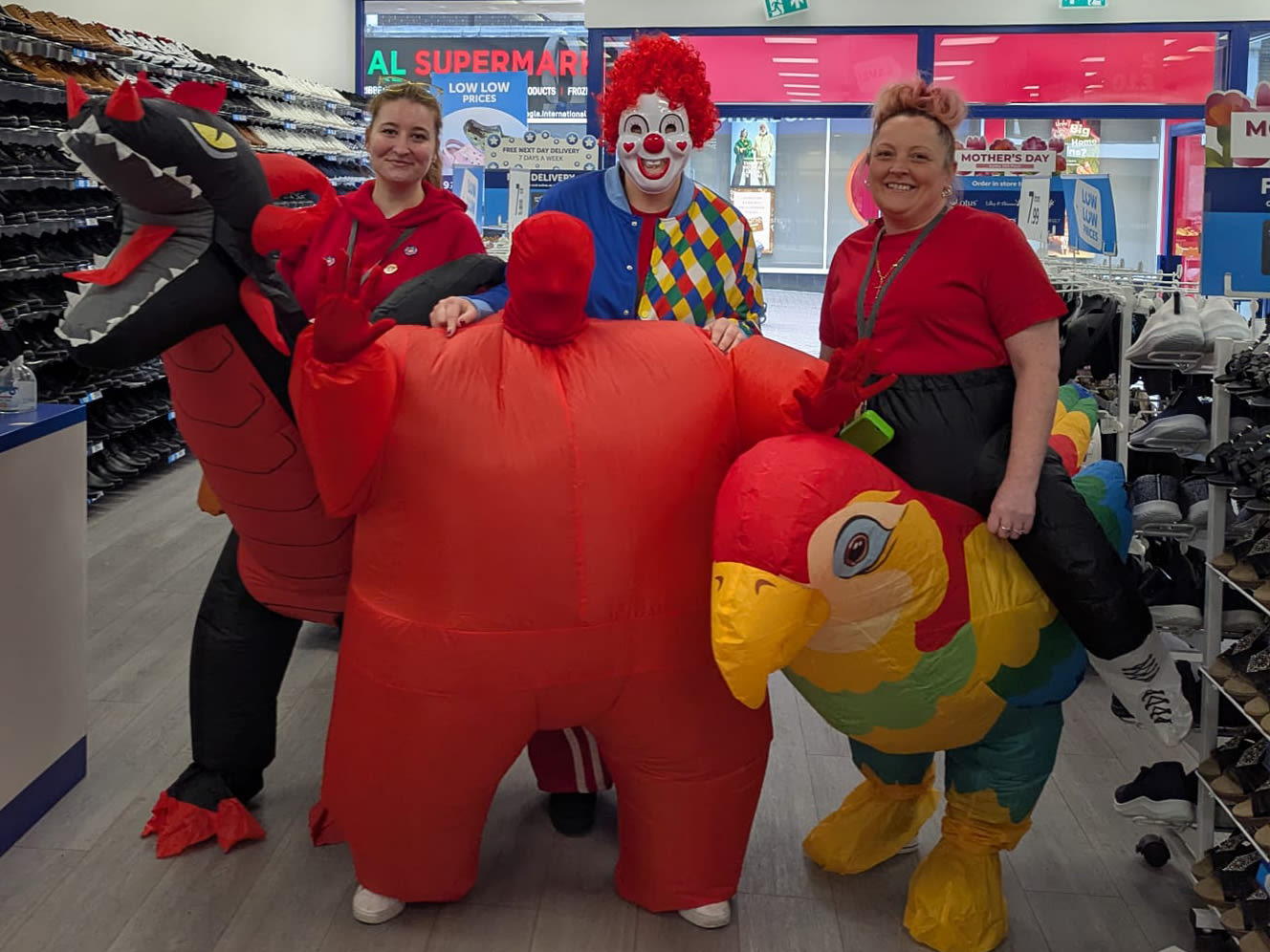 Staff at shoezone wearing their fancy dress outfits