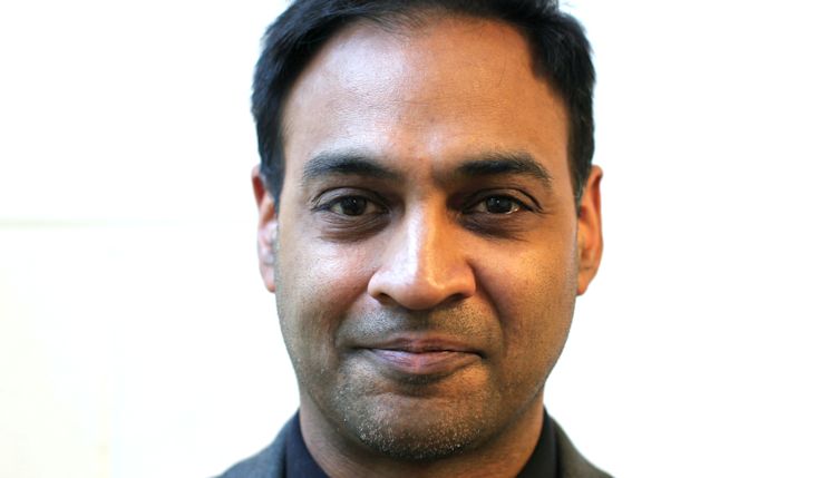 Samir Patel smiling.