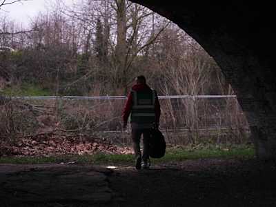 Andy, a maintenance worker for Spear, takes out a bin bag.