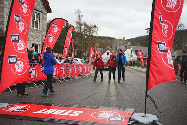 Emma, Oti and Rylan on the start line of their Red Nose Day challenge in Scotland.