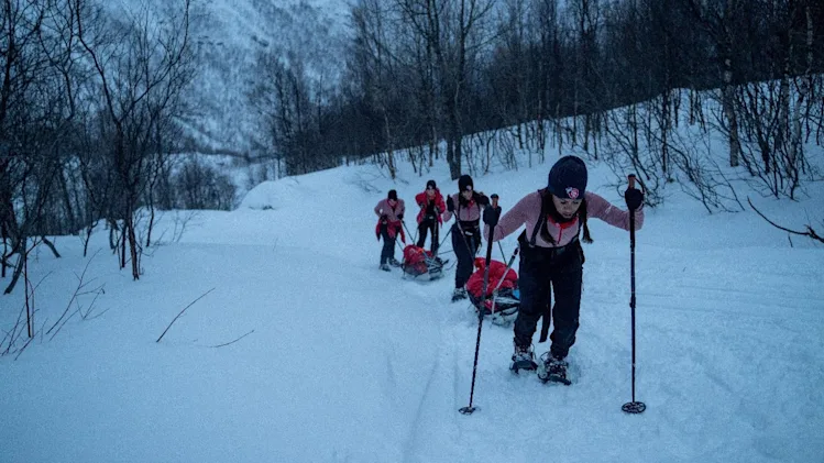 Alex Scott, Sara Davies, Vicky Pattinsonand Laura Whitmore ascend a snow-covered mountain on day two of the Red Nose Day Artic Challenge.