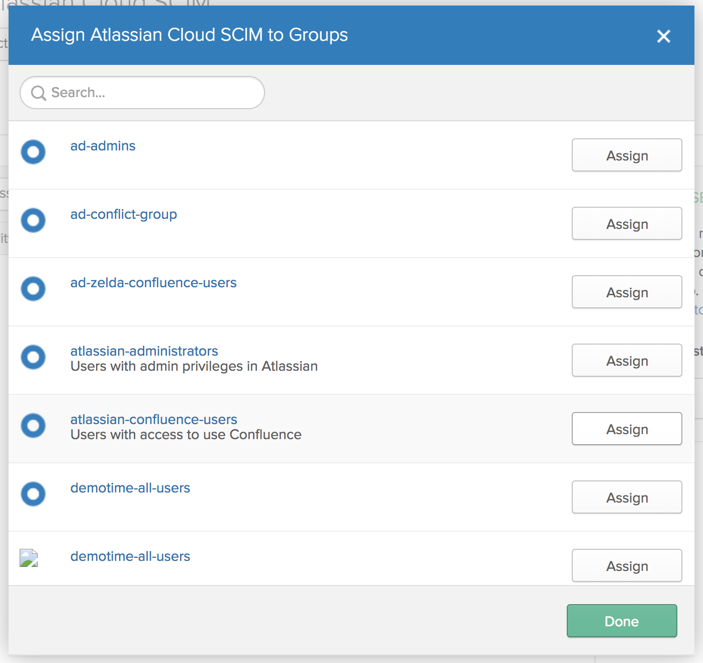 Atlassian Cloud SCIM グループリストを割り当てます。すべてのグループに [割り当て] ボタンがあります。下部に [完了] ボタンがあります。