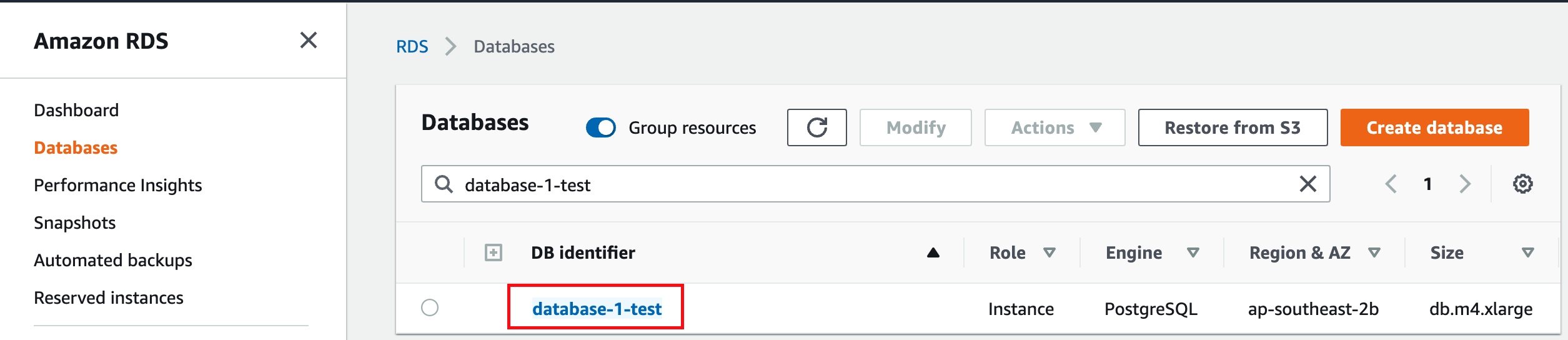 Screenshot showing RDS > Databases and a search for 'database-1-test'. There is a single result which is a PostgreSQL database. there is the option to create a database or 'Restore from S3'. There is also a settings "cog" icon that can be clicked
