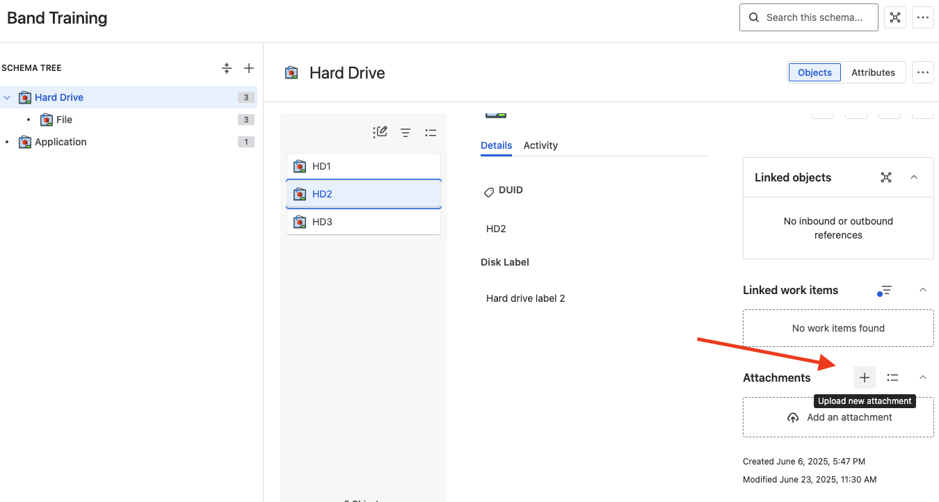 The "Attachments" section is highlighted, with options to upload or add a new attachment.  The schema tree shows "Hard Drive," "File," and "Application" categories.