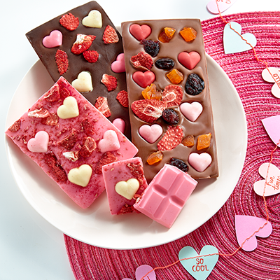 Chocolate Bars Decorated with Hearts, Fruits and Sprinkles