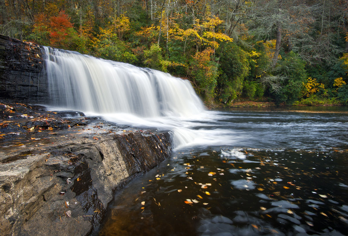 Brevard Transylvania county waterfalls. Hooker Falls at Dupont State Park in the fall.