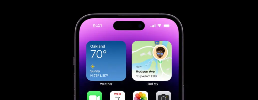 De bovenste helft van een iphone 14 pro max scherm waarop widgets en apps te zien zijn