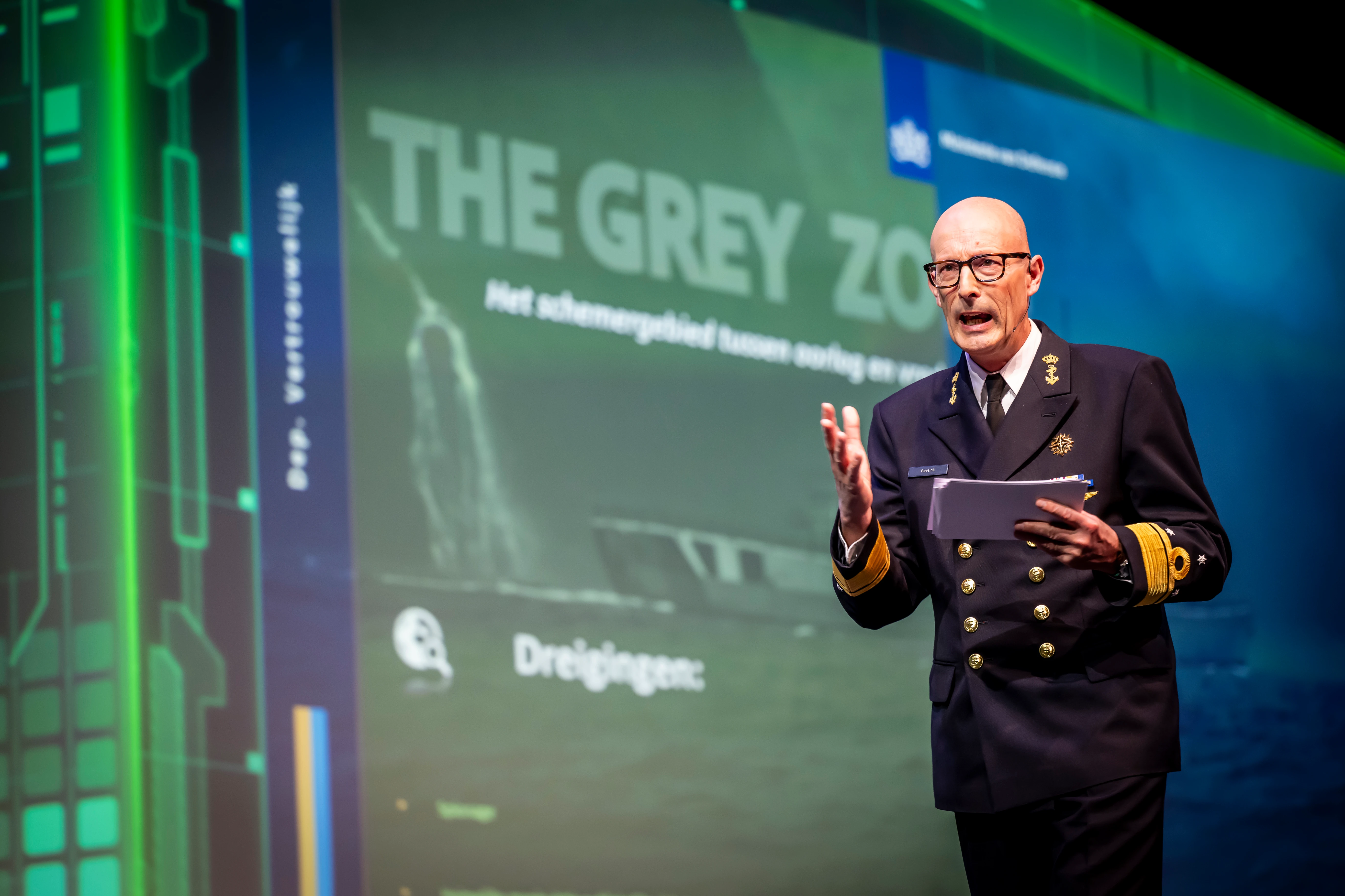 Persoon geeft een presentatie tijdens NLSecure[ID] event