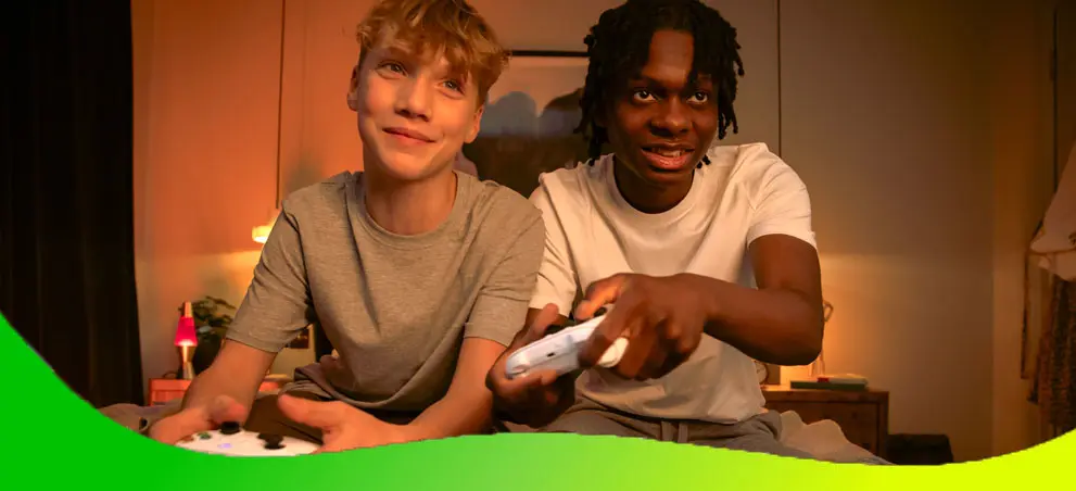 Gaming: 2 jongens spelen xbox spel