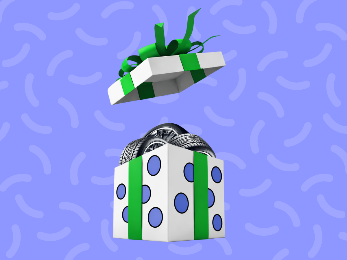 Afbeelding van autobanden in een open cadeau'tje