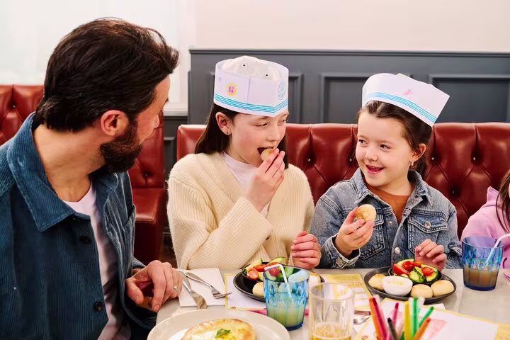 A family enjoying a meal at Pizza Express