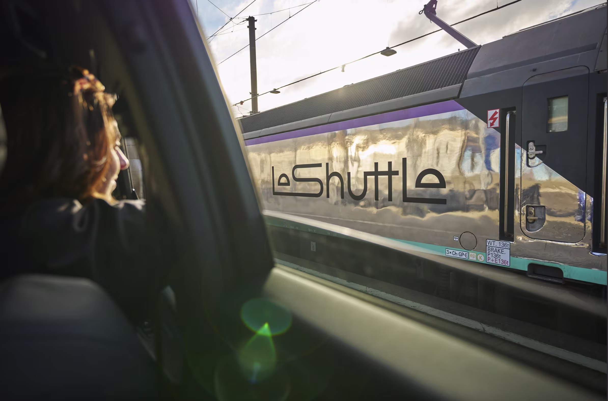 passenger looks out to see a LeShuttle train