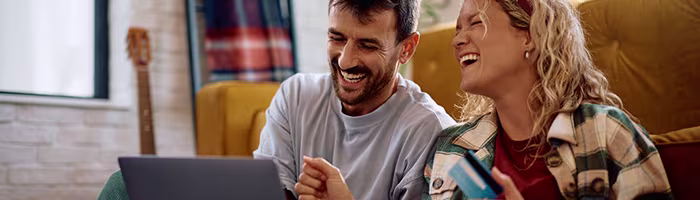 Two people purchasing Avios online
