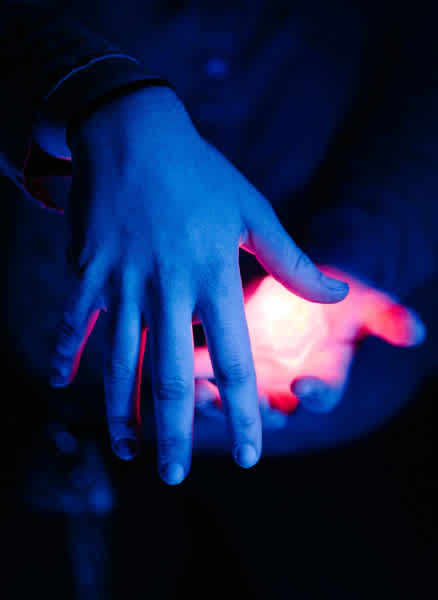 Hands holding light