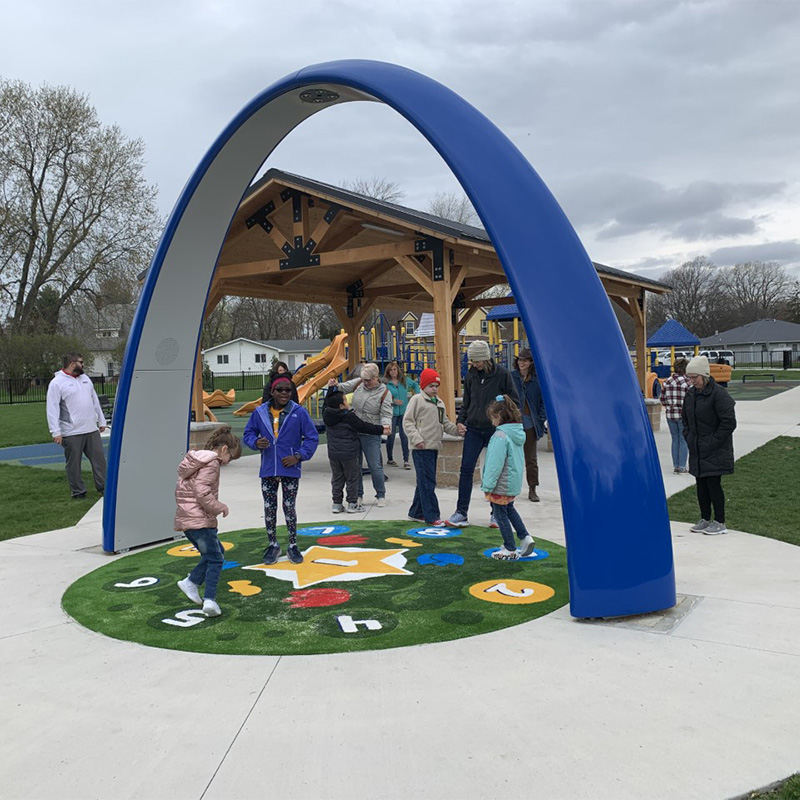 Children playing under the Lappset Sona | Wonder Spelen Pella in Pella, IA