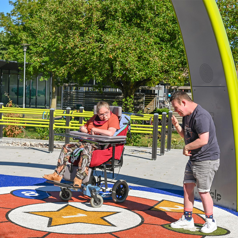 Residents from Ipse de Bruggen playing together under the Sona Interactive dance and play arch