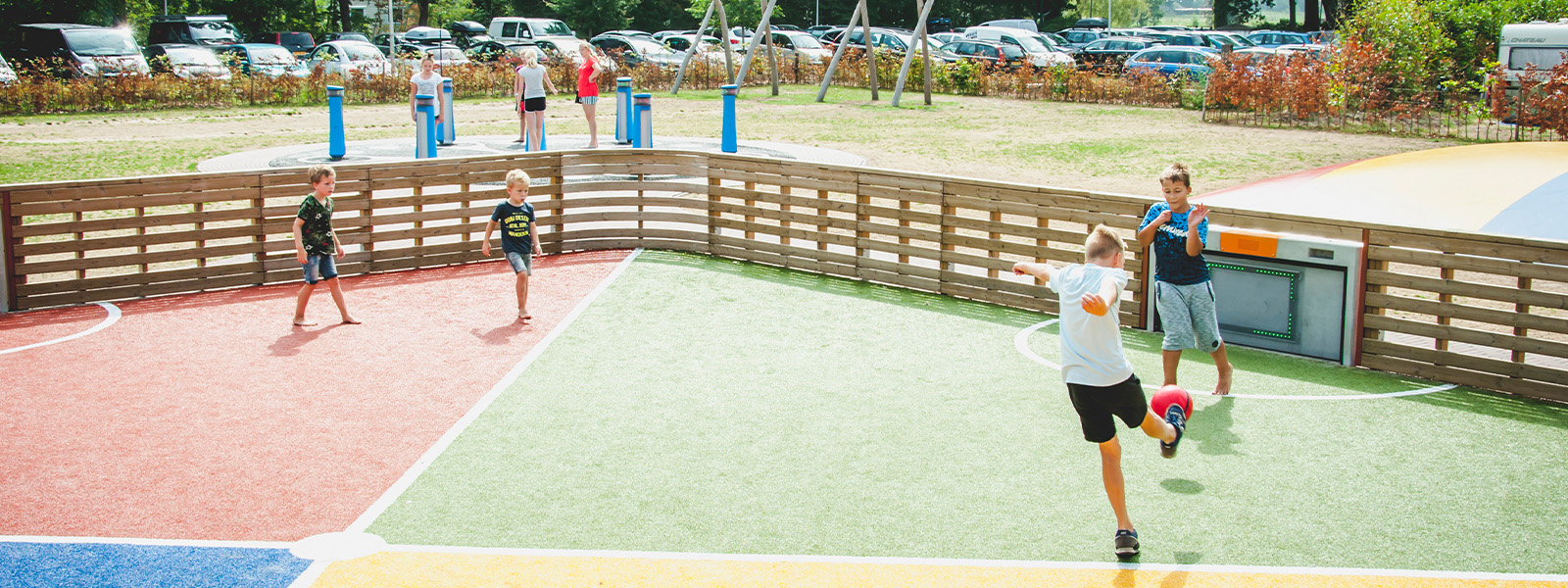 Children playing on Lappset Toro Interactive sports arena.