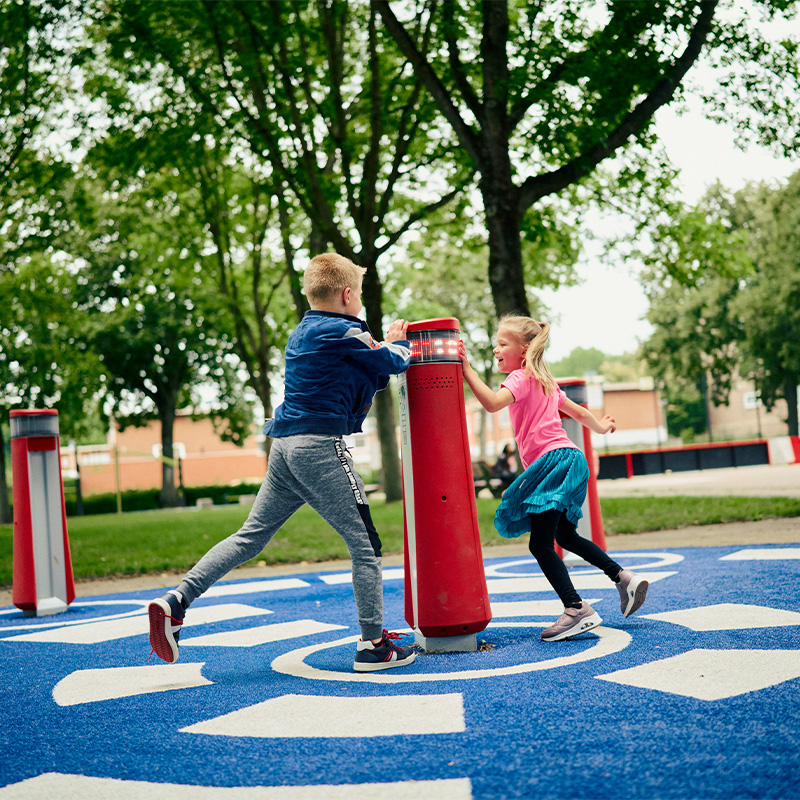 Children playing tag on the Memo