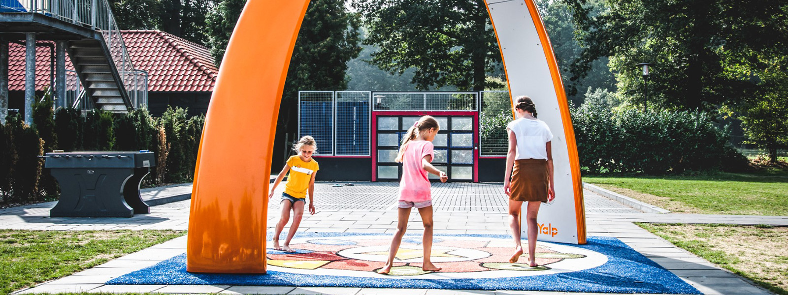 Children playing under the Sona at the camping ground De Koeksebelt, The Netherlands