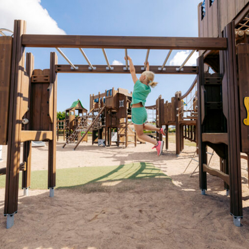 A girl climbs on Vikingaborgen at Öland, Sweden. Photo: Borgholms kommun