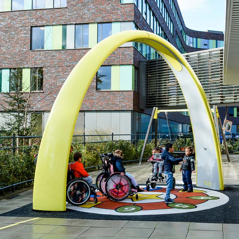 Children playing under the Sona at special needs school in Den Haag, The Netherlands
