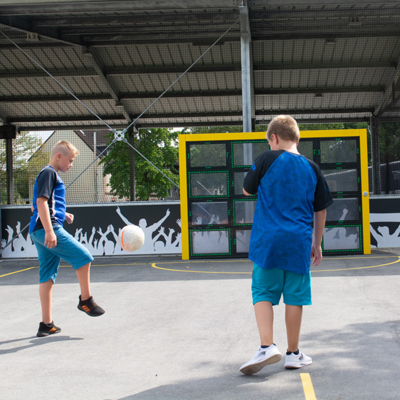 Children playing soccer on the Sutu Interactive ball wall 