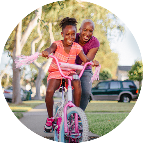 grandmother and granddaughter riding bike