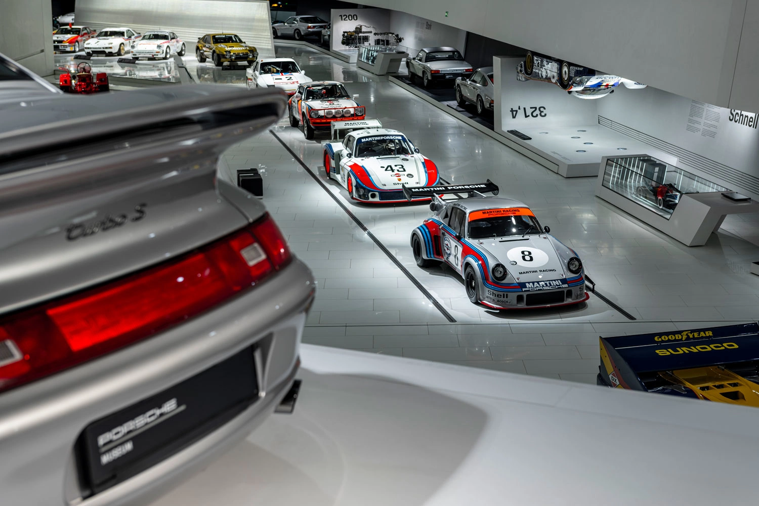 Various Porsche models on display in the Porsche Museum.